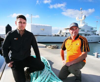 Project manager Scott Davies-Colley and Wharf manager Blair Smeal at the new pontoon with Senses in the background.